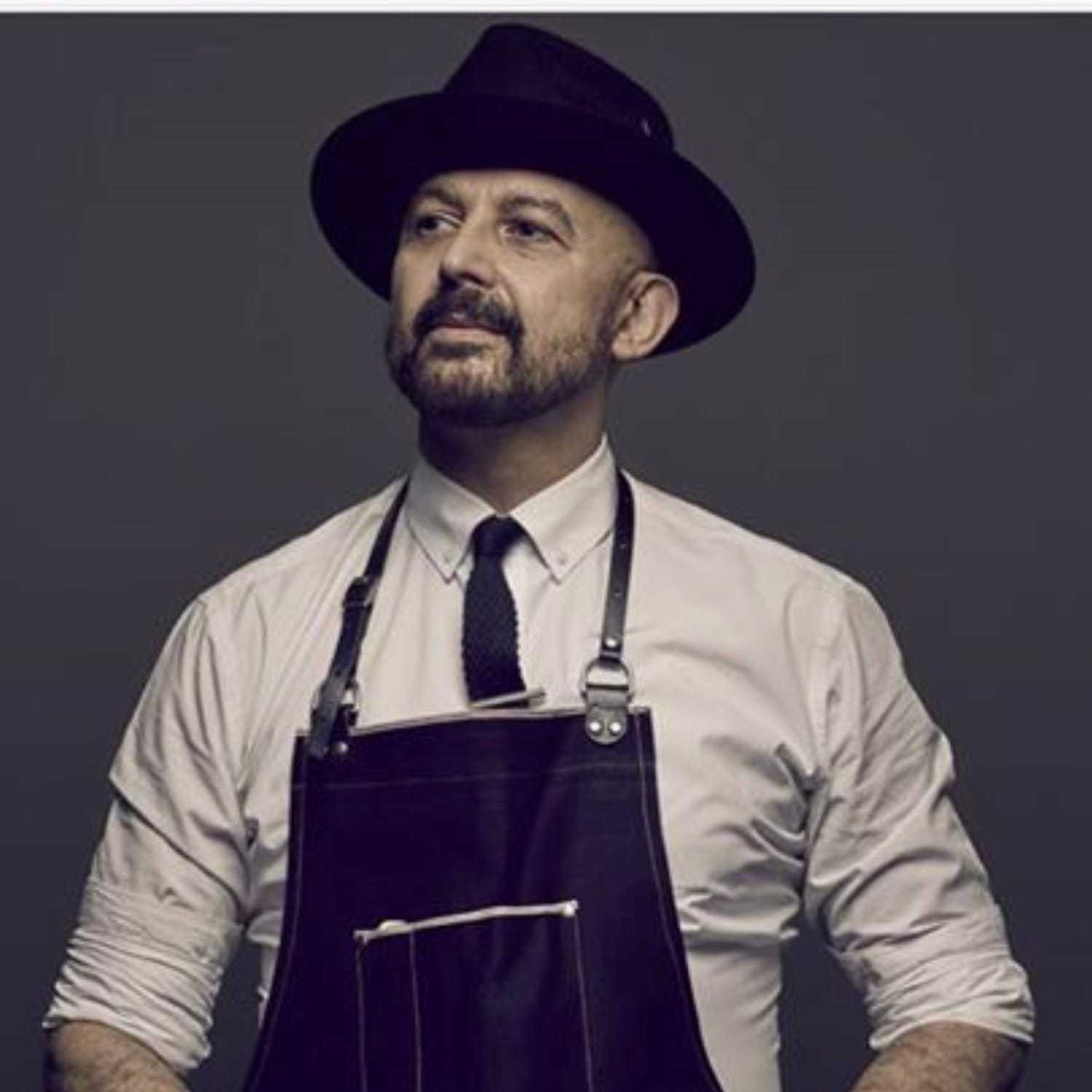 Portrait of Damian Santiago, a professional stylist at Mizu Louis Licari, showcasing their expertise and style.