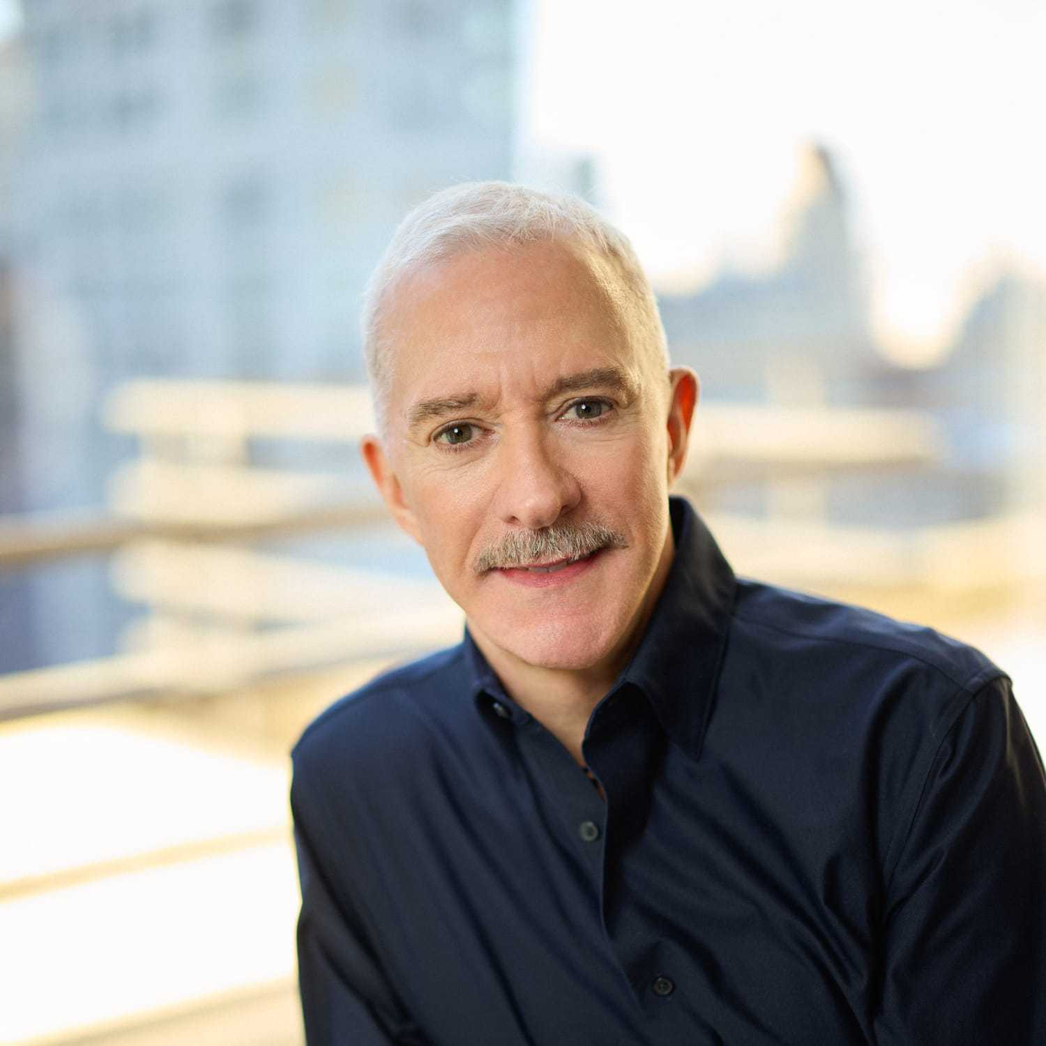 Portrait of Rick Buckler, a professional stylist at Mizu Louis Licari, showcasing their expertise and style.