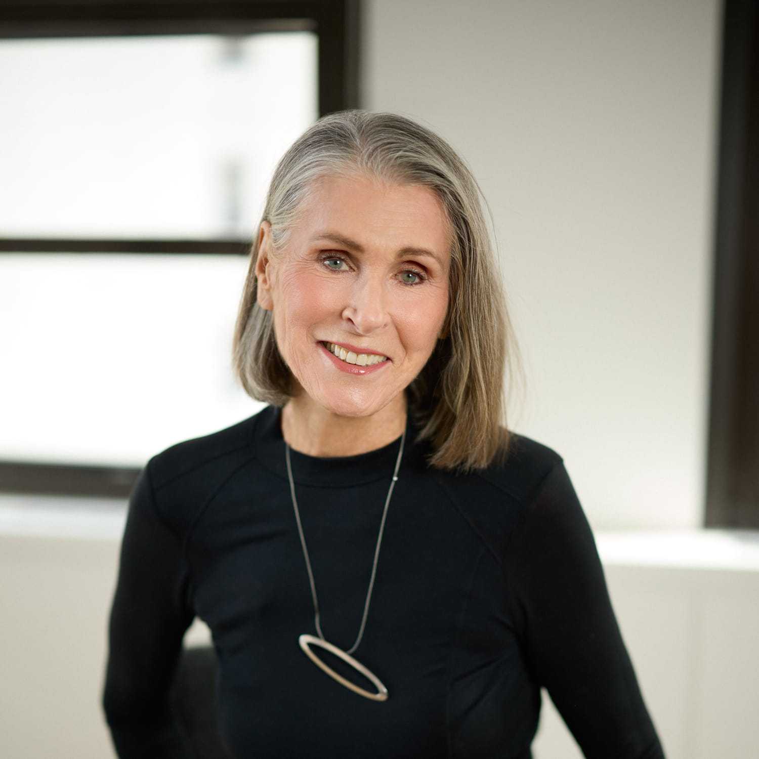 Portrait of Sasha Eastham, a professional stylist at Mizu Louis Licari, showcasing their expertise and style.