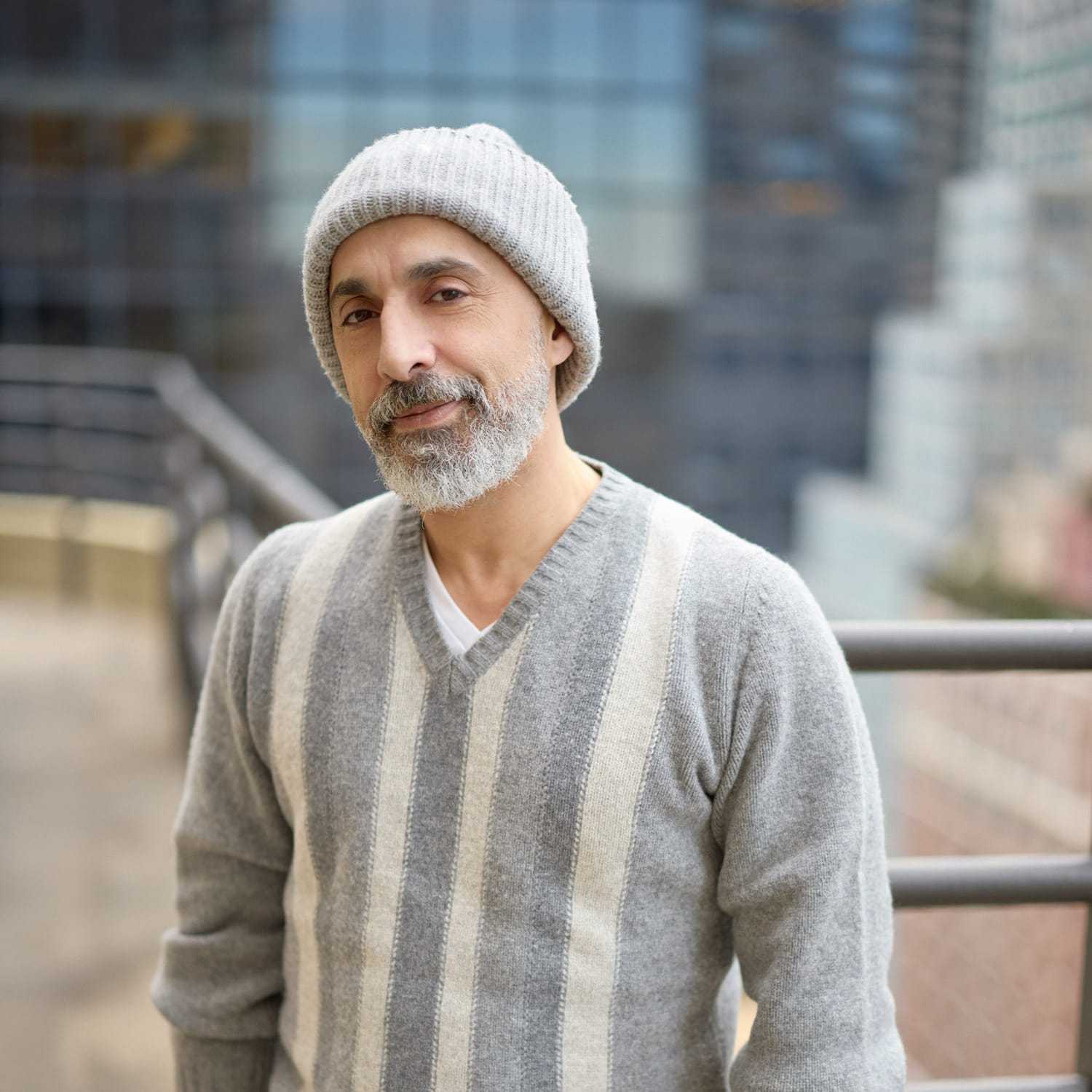 Portrait of Sam Ruvinov, a professional stylist at Mizu Louis Licari, showcasing their expertise and style.