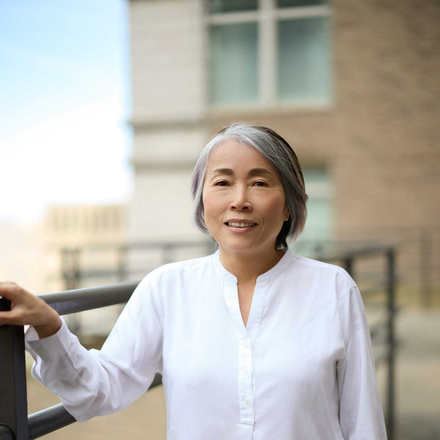 Portrait of Aya Saito, a professional stylist at Mizu Louis Licari, showcasing their expertise and style.