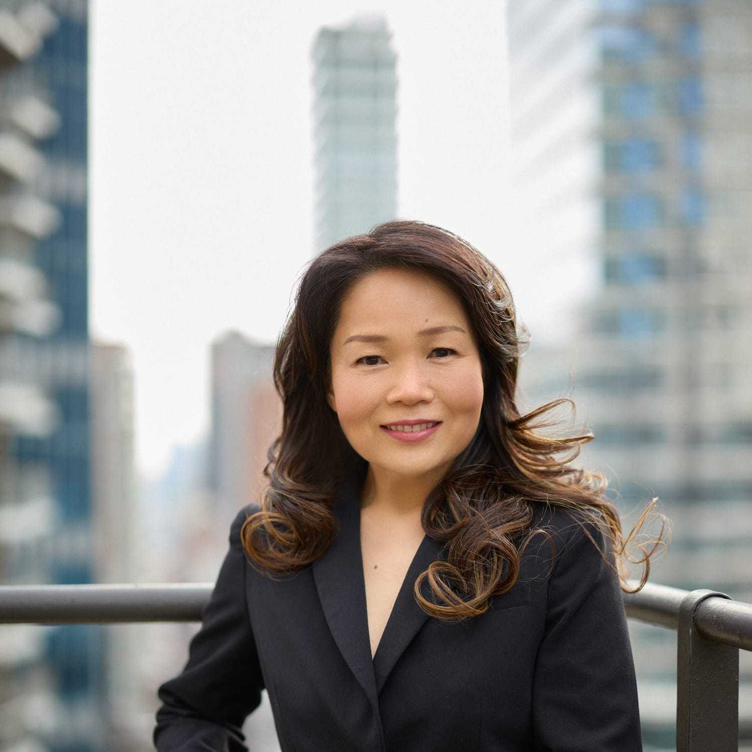 Portrait of Kazu Suzuki, a professional stylist at Mizu Louis Licari, showcasing their expertise and style.