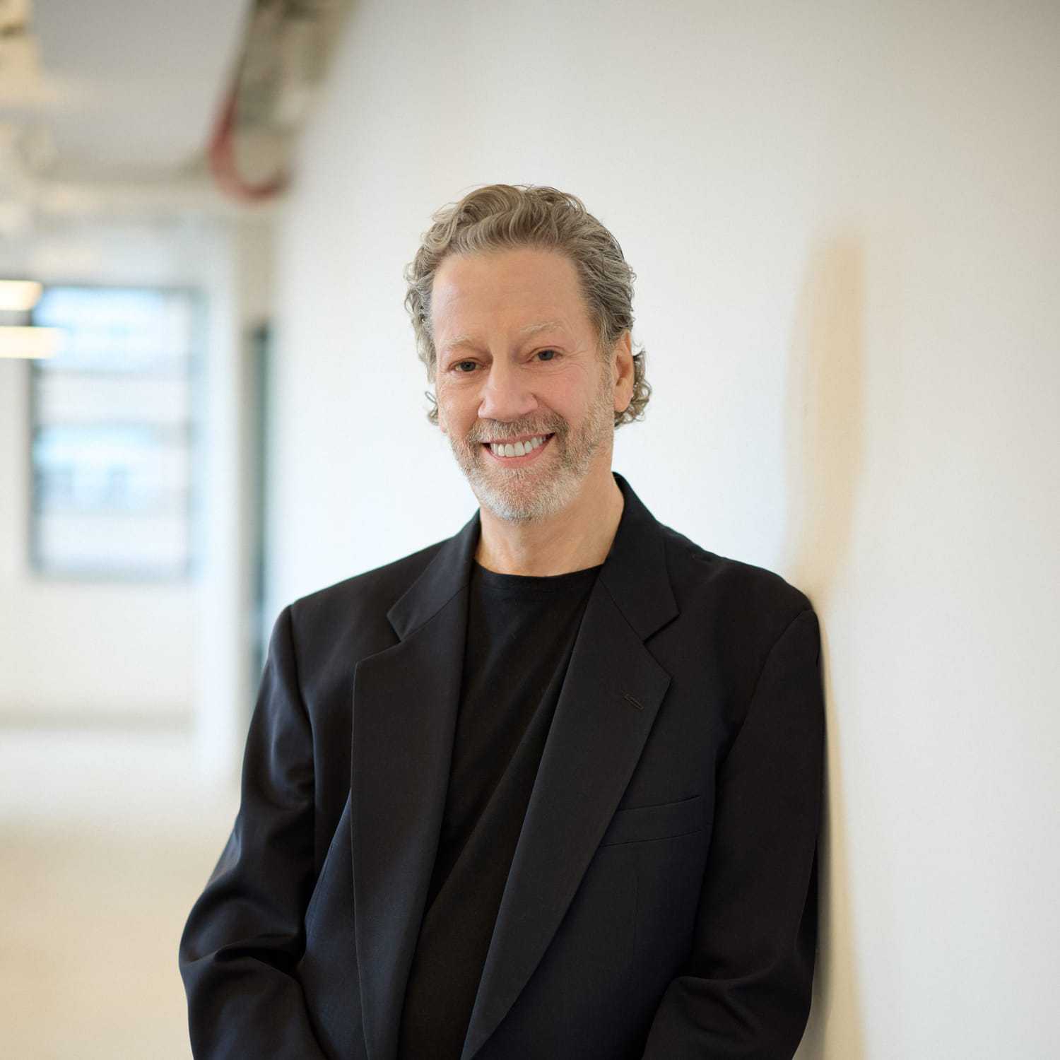 Portrait of Brian Murphy, a professional stylist at Mizu Louis Licari, showcasing their expertise and style.